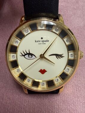 kate spade Gold-Tone Winking Face Watch with Black Strap